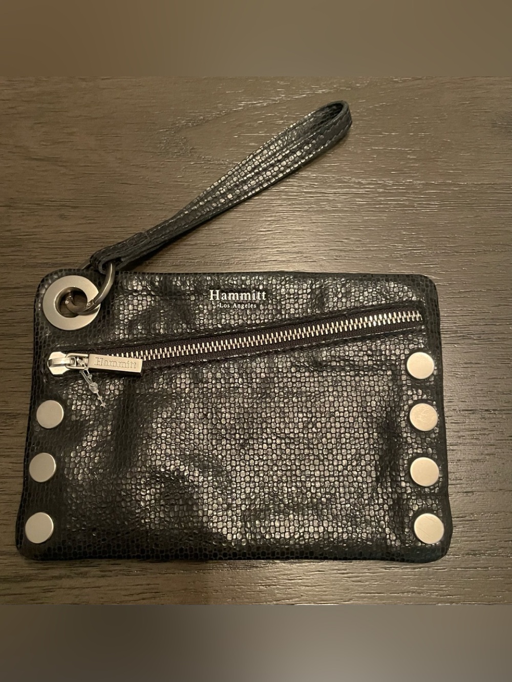 Hammitt Los Angeles features, black textured snakeskin-embossed leather wristlet